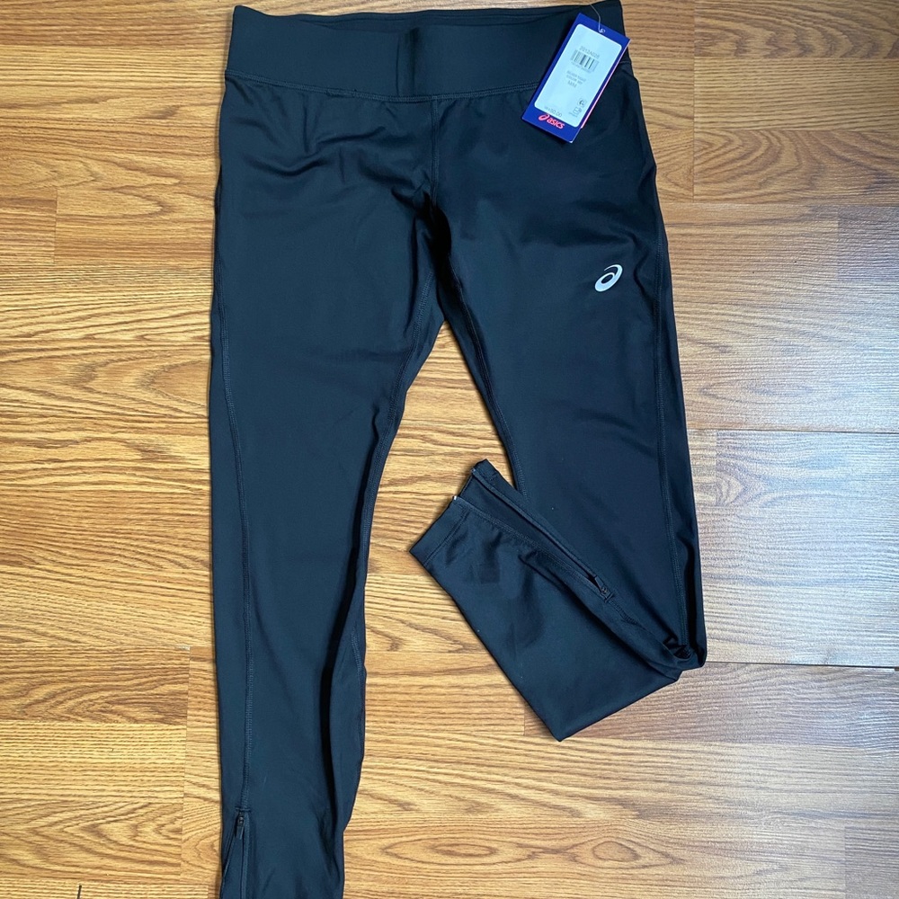 ASICS leggings with zipper on ankles.